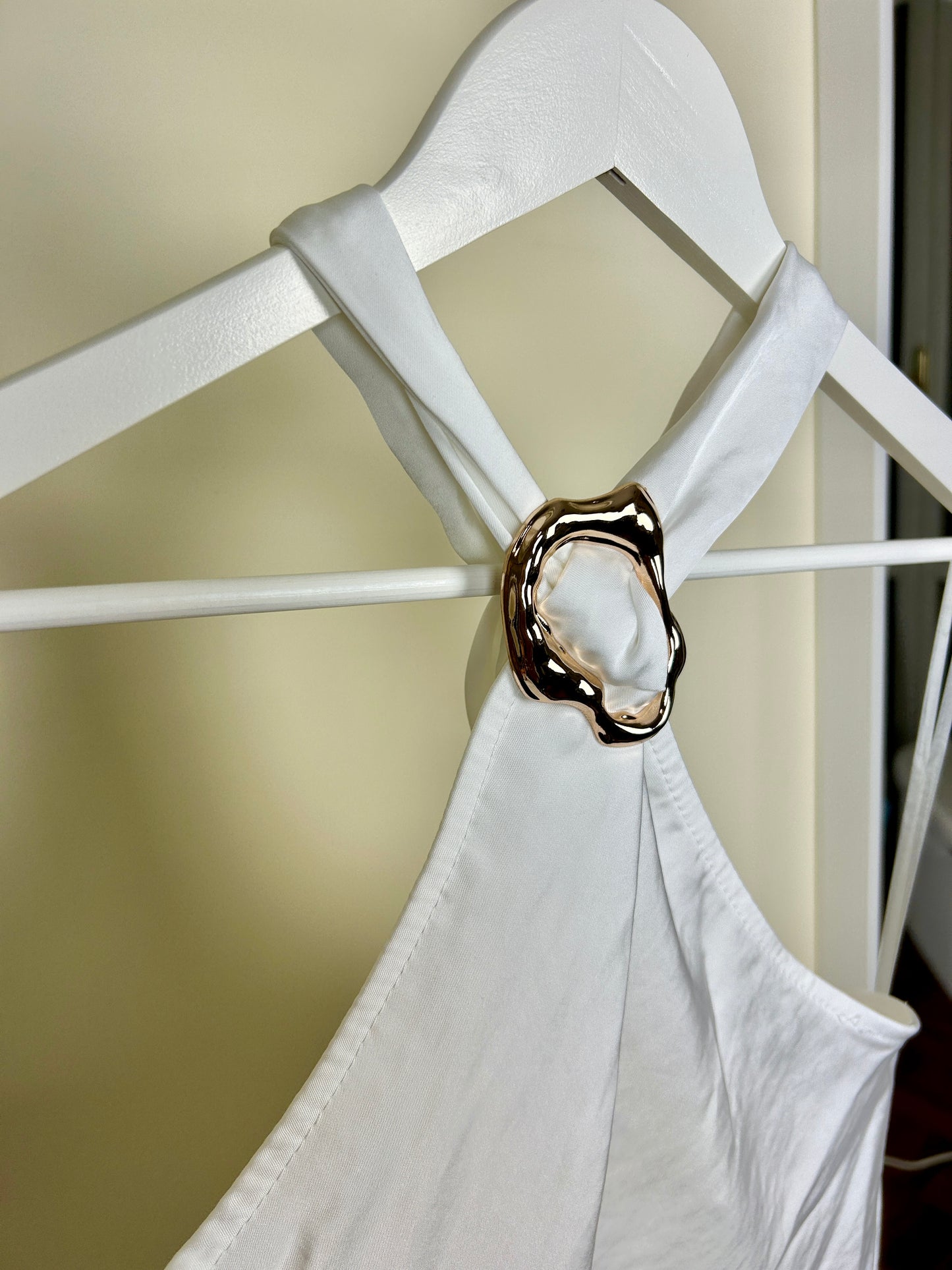 Top Claudia con gioiello